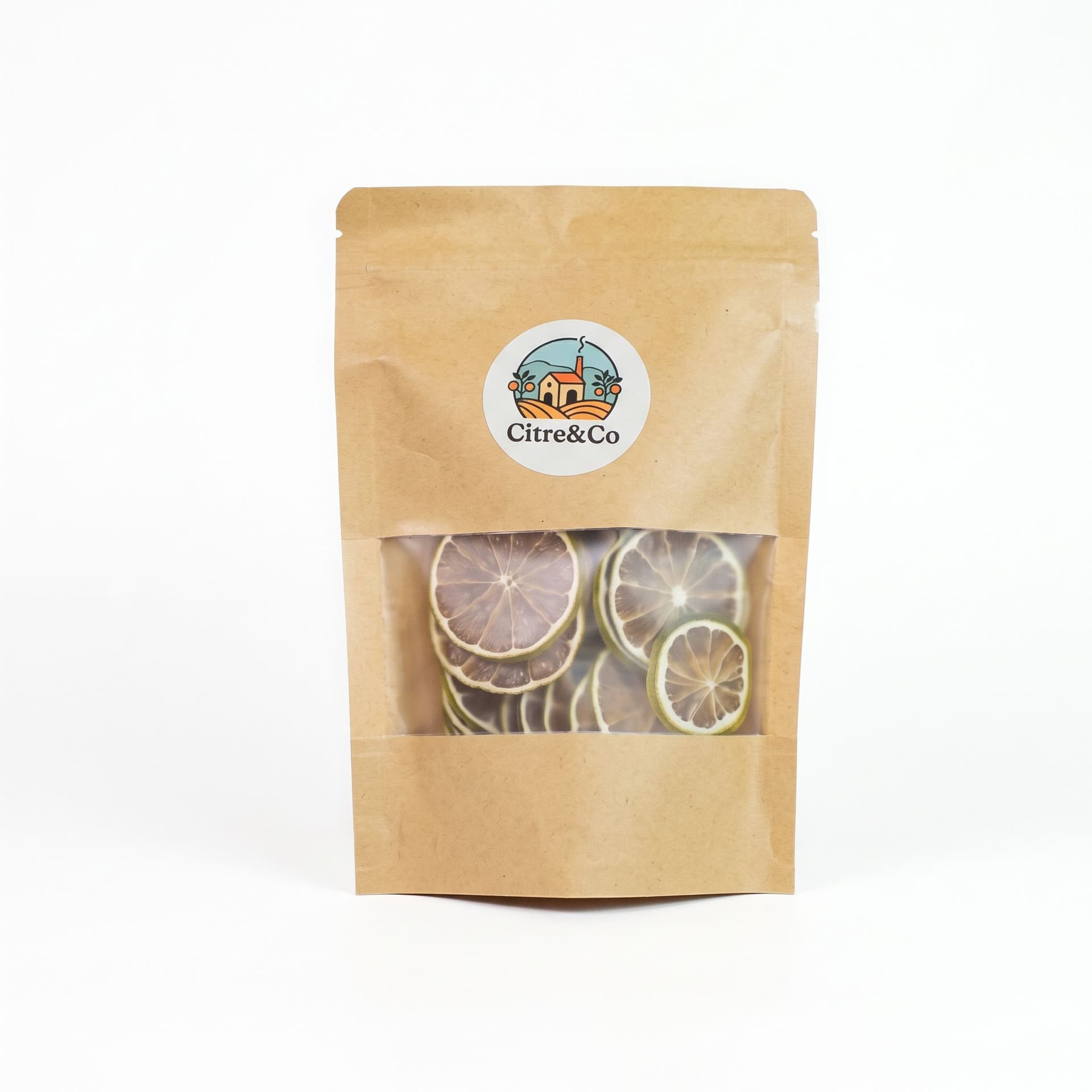 Citre&Co Starter Pack mit getrockneten Limettenscheiben in einer braunen Kraftpapier-Verpackung mit Sichtfenster auf weißem Hintergrund.